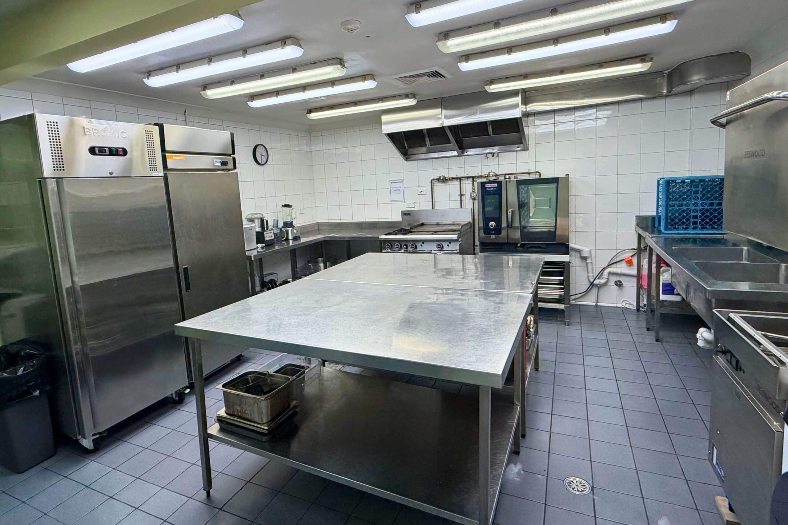 Commercial kitchen for hire with stainless steel workstation at Main Office Pagewood Sydney